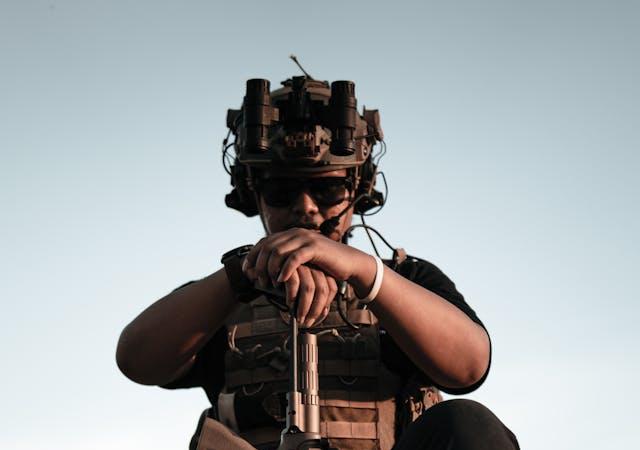 tactical man aiming down
