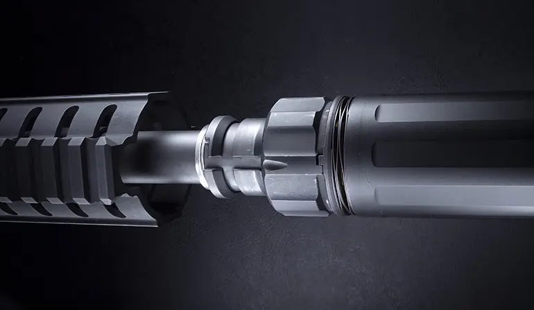 Silencer with black background.