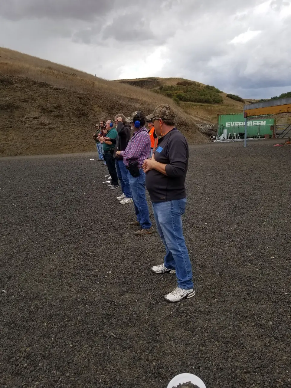 Men in the shooting field